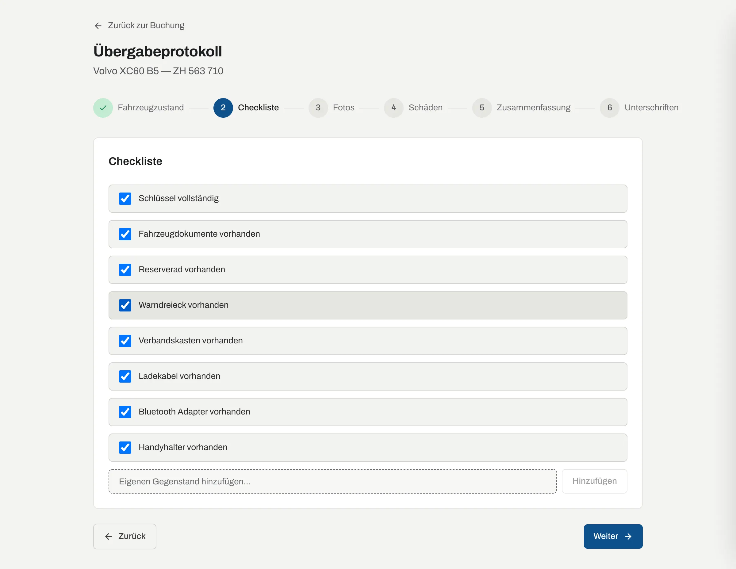 Übergabeprotokoll Schritt Checkliste mit Schlüssel, Dokumenten, Reserverad und eigenem Gegenstand