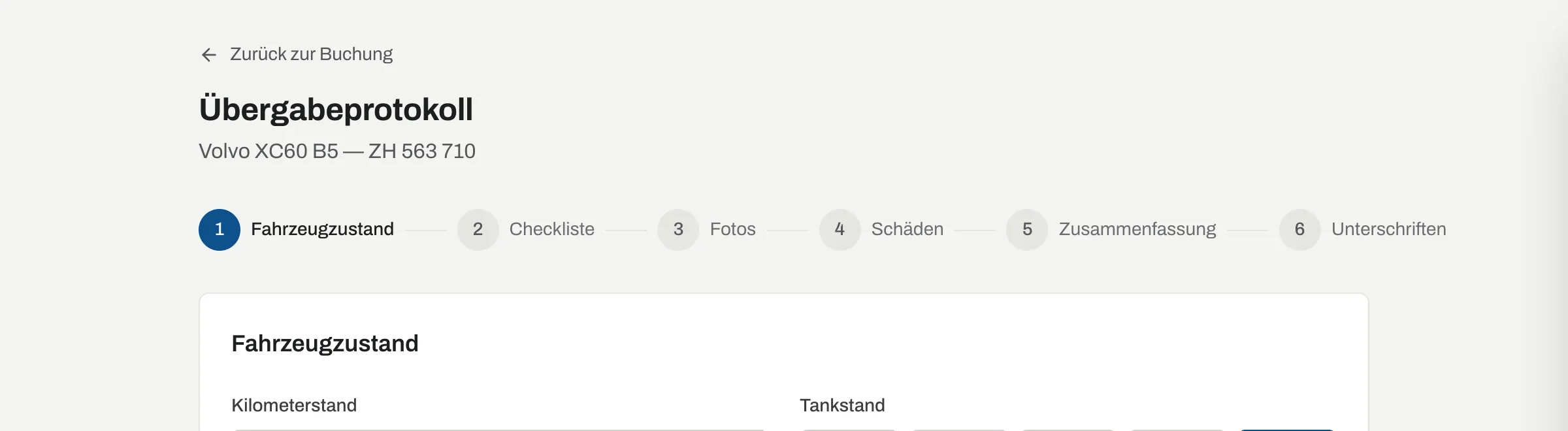Erster Schritt des Übergabeprotokolls mit Kilometerstand, Tankstand und Fortschritt über sechs Schritte